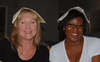 Renee and Gail with Napkins on their heads