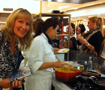 Me leaning in at cooking demonstration