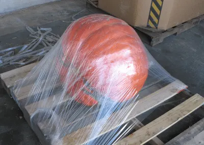 Shrinkwrapped giant pumpkin on pallet