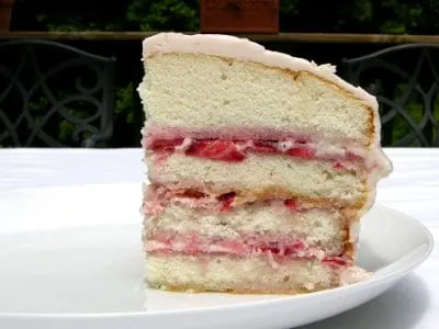 Cake made with fresh strawberries, jam, and cream cheese frosting