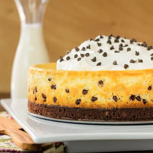 https://magnoliadays.com/wp-content/uploads/2014/03/Brownie-Chocolate-Chip-Cheesecake-1.jpg.webp