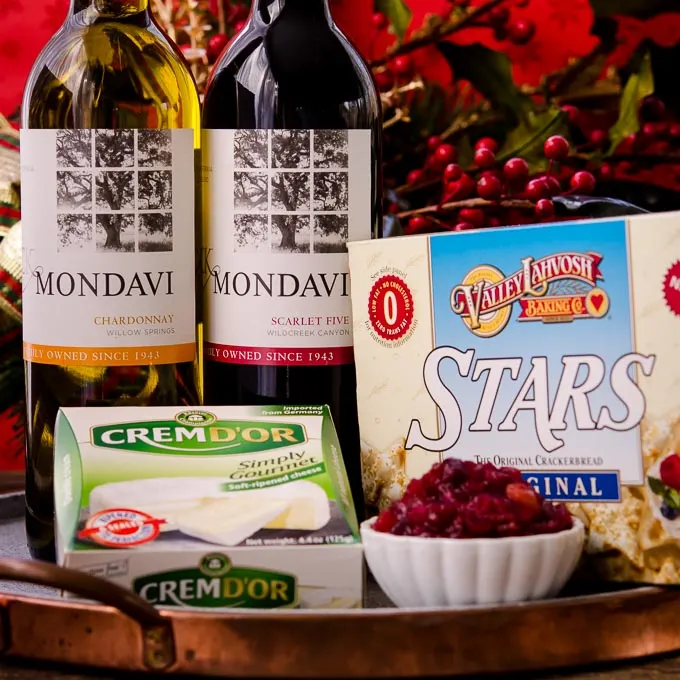 Get your party started with Apple Cranberry Chutney, CK Mondavi Wine, cheese, and crackers.