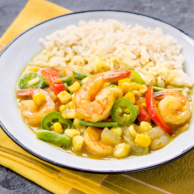 Thai Yellow Curry Shrimp is healthy comfort food. It is bursting with flavor, loaded with shrimp and vegetables, plus quick and easy to make.