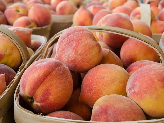 Fresh Peaches in Baskets