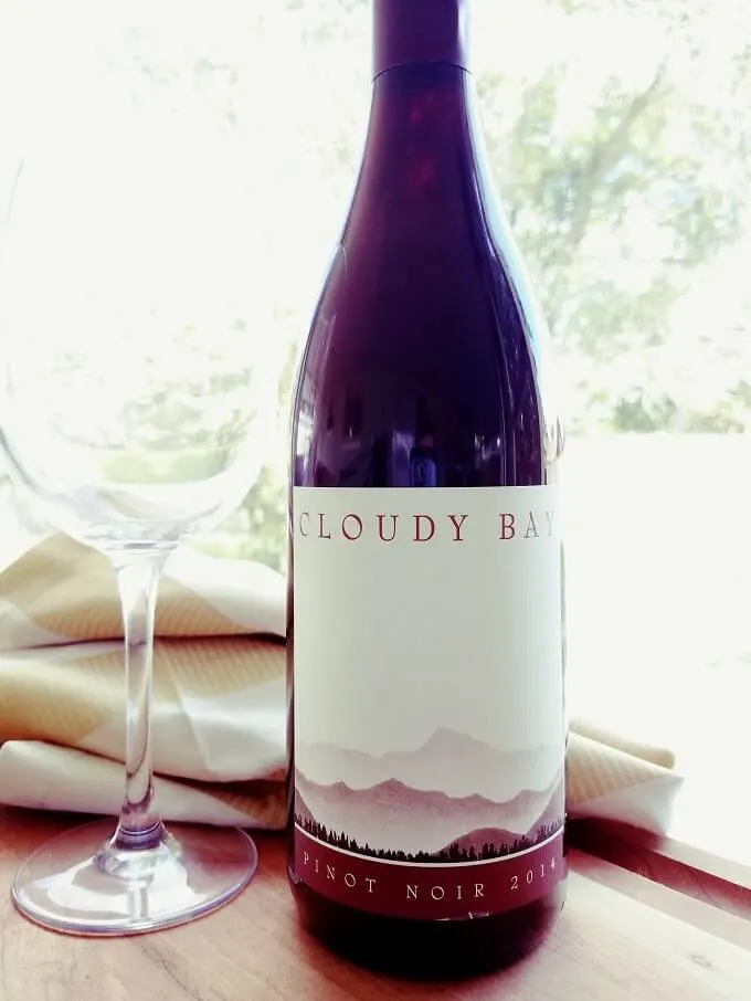 Cloudy Bay Pinot Noir 2014 bottle with wine glass