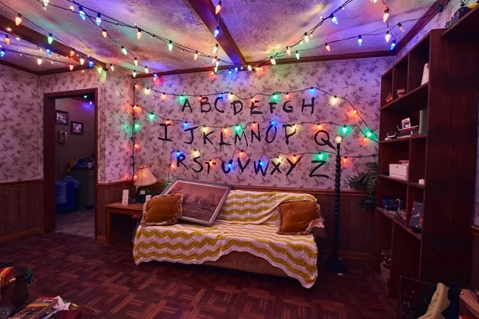 Scary Stranger Things haunted house living room with Christmas lights