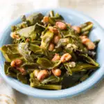 Hoppin John collard greens and black eyed peas in a blue dish