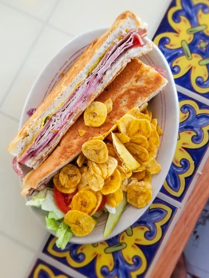 Classic cuban sandwich and plantain chips at Columbia Cafe