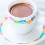 White demitasse cup and saucer with sugar free hot chocolate